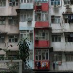 Small Apartments - Balconies in a Rusty Residential Building