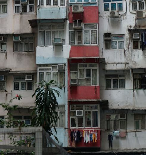 Small Apartments - Balconies in a Rusty Residential Building