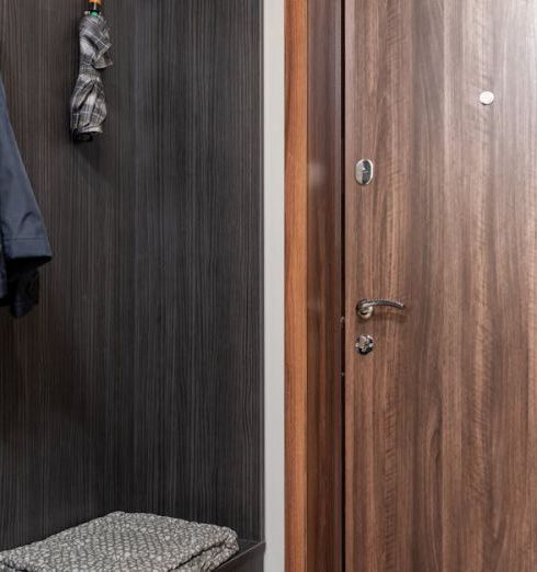 Hooks And Racks - Interior of hallway with hangers near door