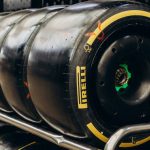 Garage Storage - Close-up shot of Pirelli racing tires stored in a garage. Ideal for motorsport content.