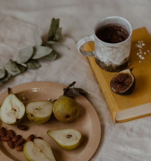 French Country - Sliced Pears on a Plate on Top of White Textile