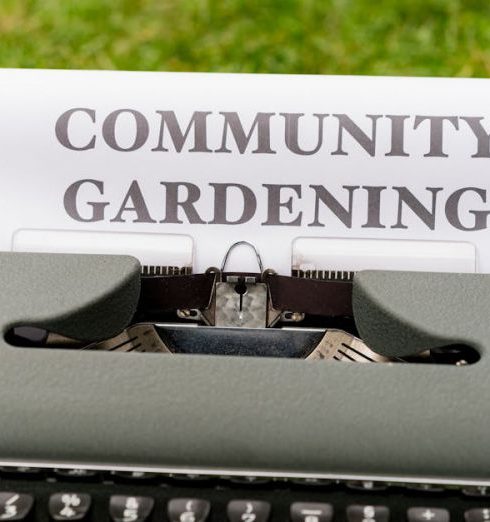 Vegetable Gardens - A typewriter with the words community gardening written on it