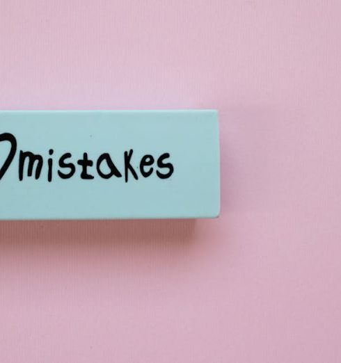 Mistakes - Minimalist eraser with 'I Love Mistakes' message on pink background, school stationery.