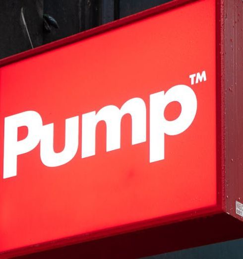 Trademark - Vibrant red Pump sign on a storefront exterior in Brussels, Belgium.