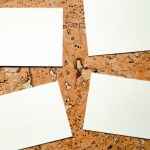 B2B Marketing - Four blank business cards on a textured marble background