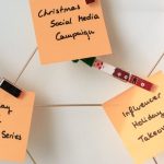 Email Campaigns - Sticky notes with holiday marketing ideas for Christmas social media and email campaigns.