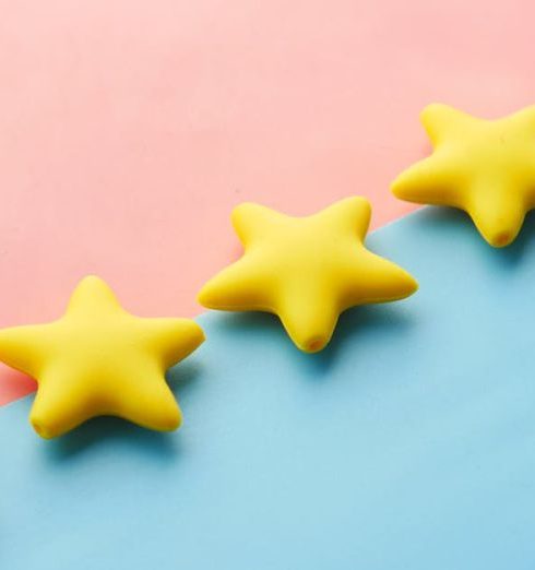 Customer Feedback - Five Yellow Stars on Blue and Pink Background