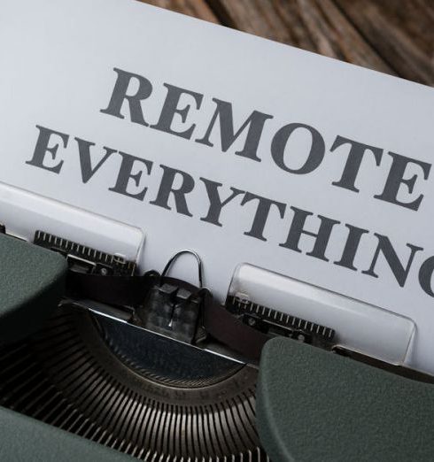 Remote Teams - Old-fashioned typewriter with a paper showing the words 'Remote Everything', symbolizing remote work and virtual connectivity.