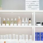 Product Lines - Well-organized skincare product display on shelves in a store setting.