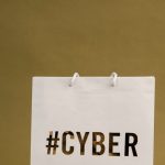 Brand Awareness - Minimalist image of a paper bag with Cyber Monday promotion text.