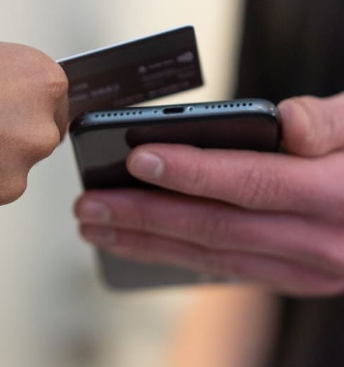 Customer Data - A contactless payment transaction using a smartphone scanner in an indoor setting.