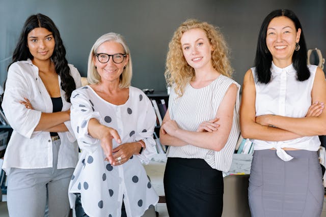 photo-of-business-women-smiling